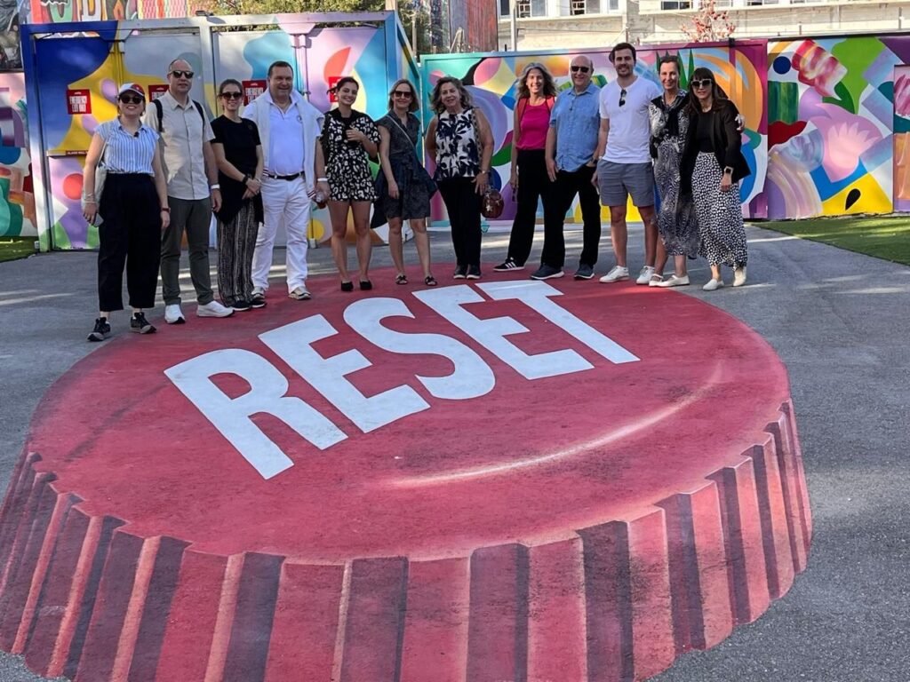 corporate event planner Miami incentive trip group experience with team at branded destination event