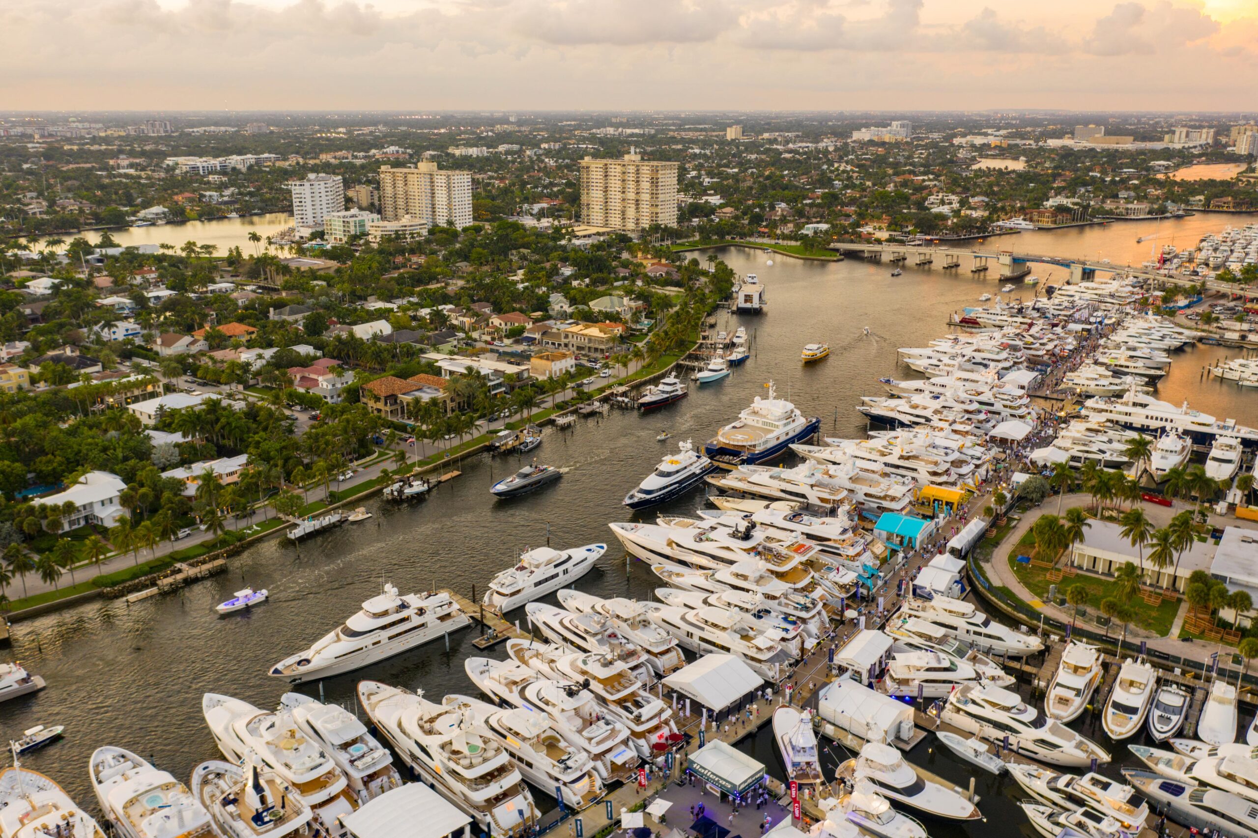 Aerial view of the Fort Lauderdale International Boat Show along the waterfront at sunset