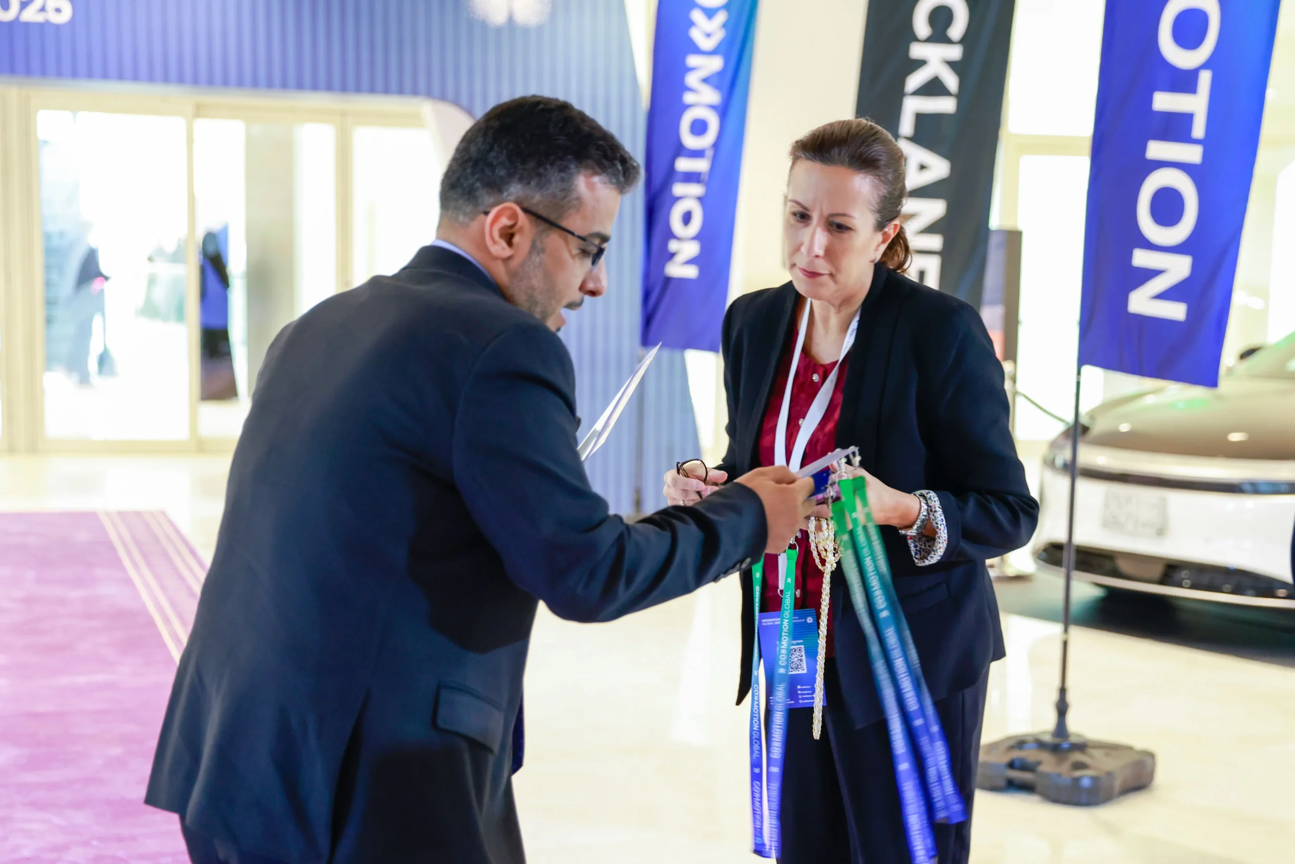 Event professionals checking badges at a corporate event in Miami
